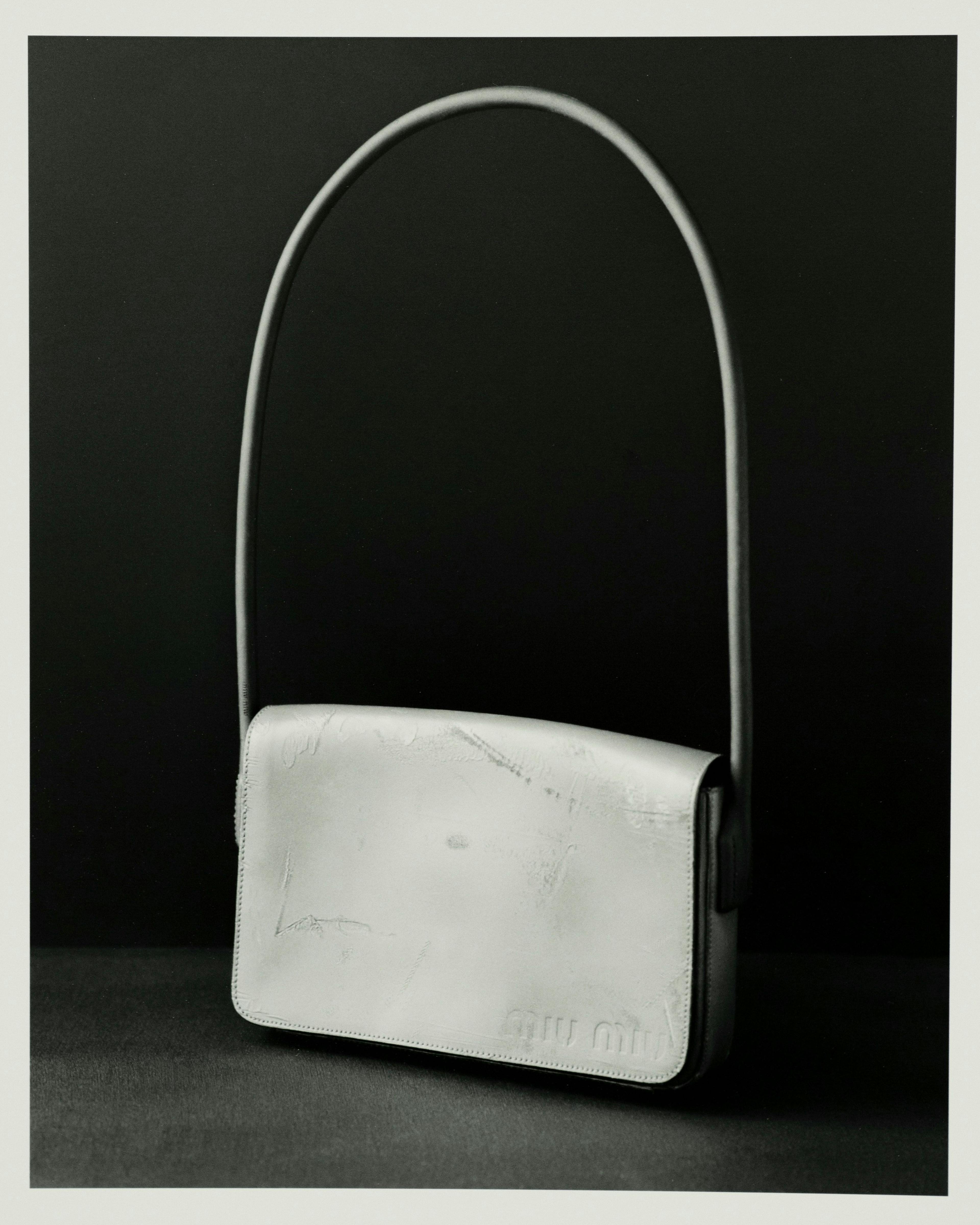 Vintage bag by Miu Miu, Fall 1998, from the David Casavant Archive. First presented with the Fall 1998 collection, this handbag represents an era of simple, ladylike silhouettes in Miuccia Prada's contemporary line.