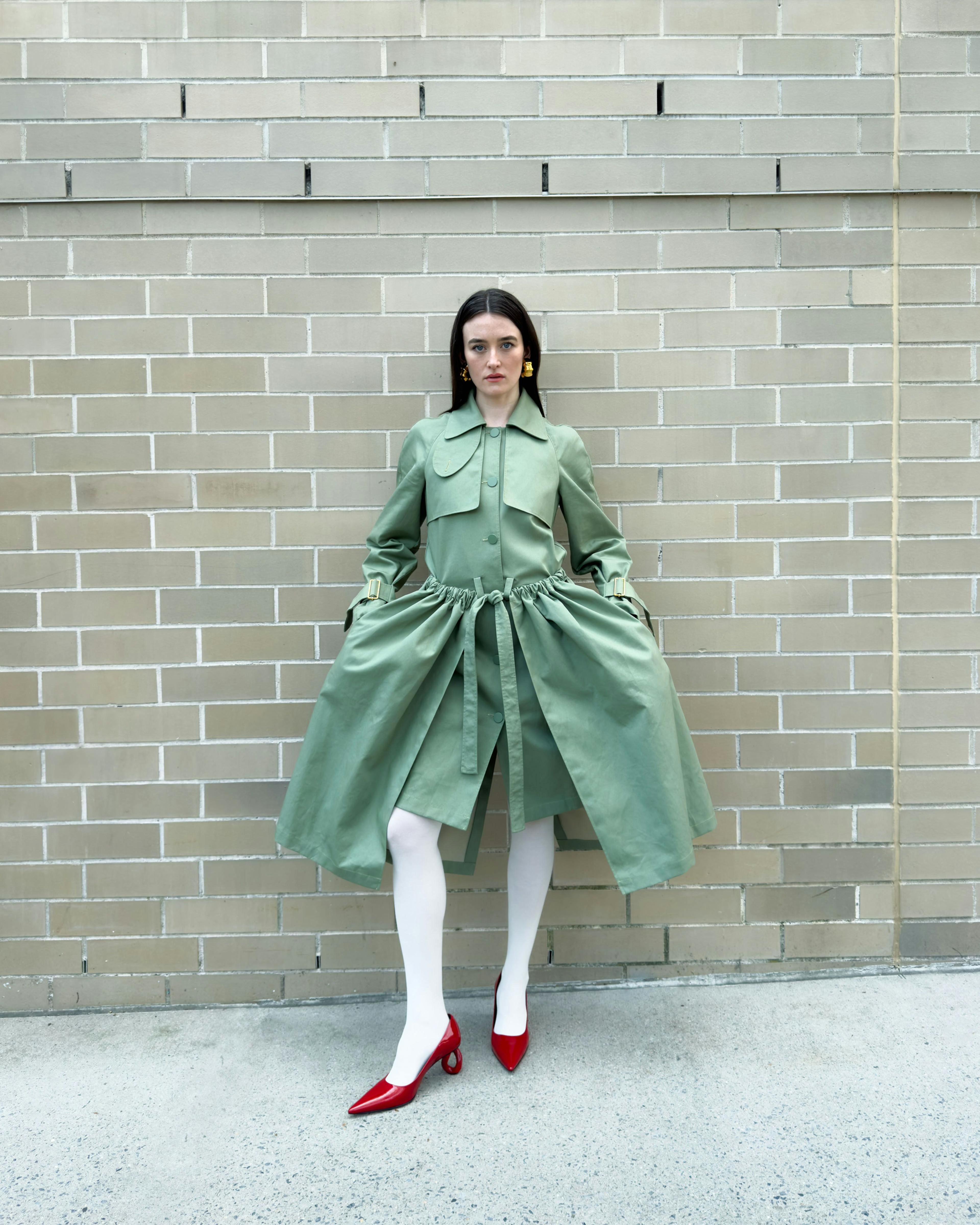 COAT and vintage SHOES by ,JW Anderson. ,TIGHTS by ,Falke. ,EARRINGS by ,Khaite.