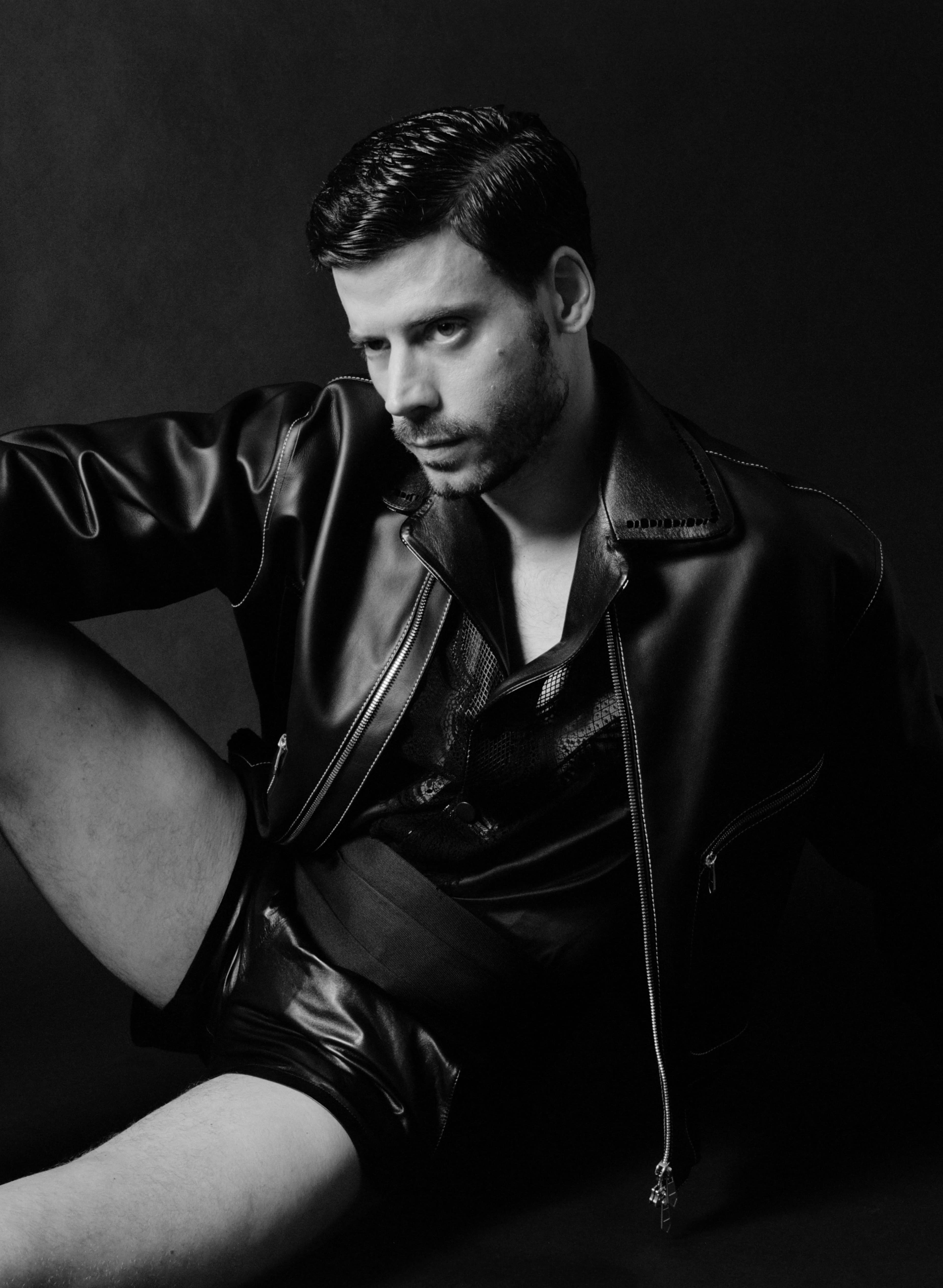 JACKET by Hermès; SHIRT, CUMMERBUND, and SHORTS by Tom Ford