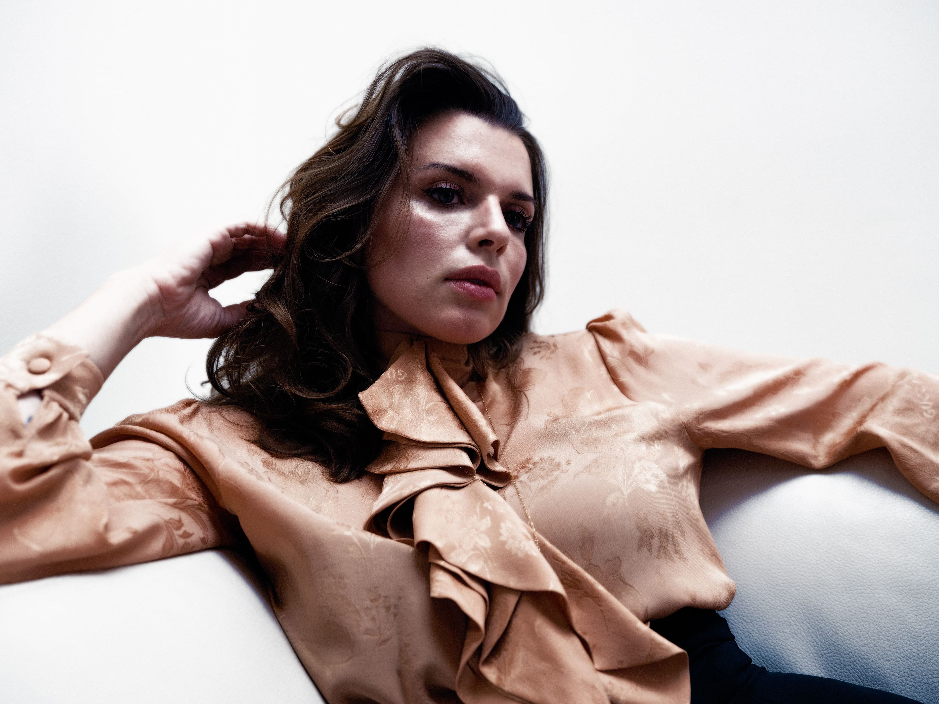 Shirt by Gucci. Skirt by Lafayette 148. Necklace by Monica Rich Kosann.