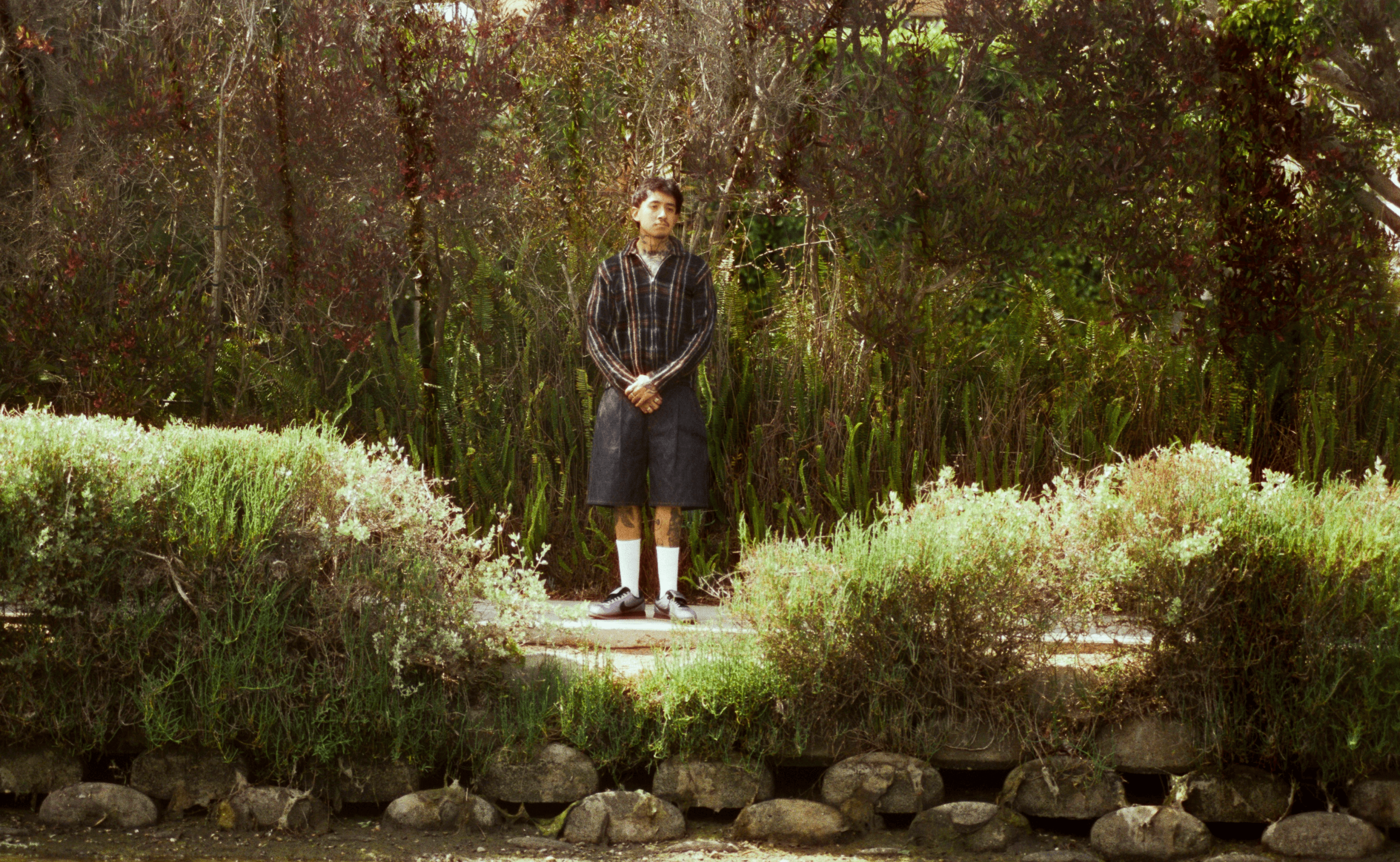 SHIRT by ,Comme des Garçons., SHORTS by ,Goodfight. ,SHOES by ,Nike..