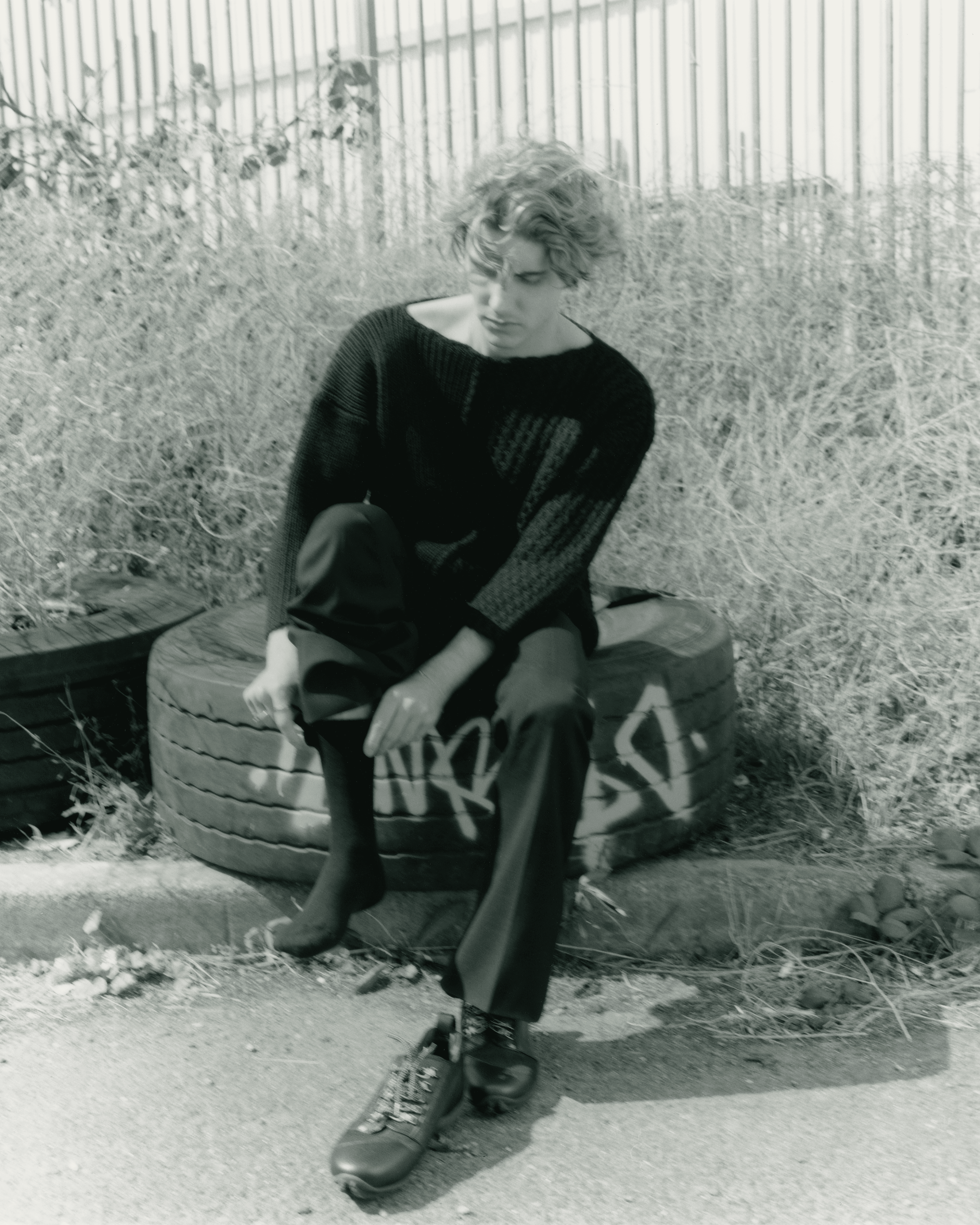 Vintage SWEATER from Little Brownings. PANTS by ,McQueen., SOCKS by ,Pantherella., SHOES, stylist’s own.