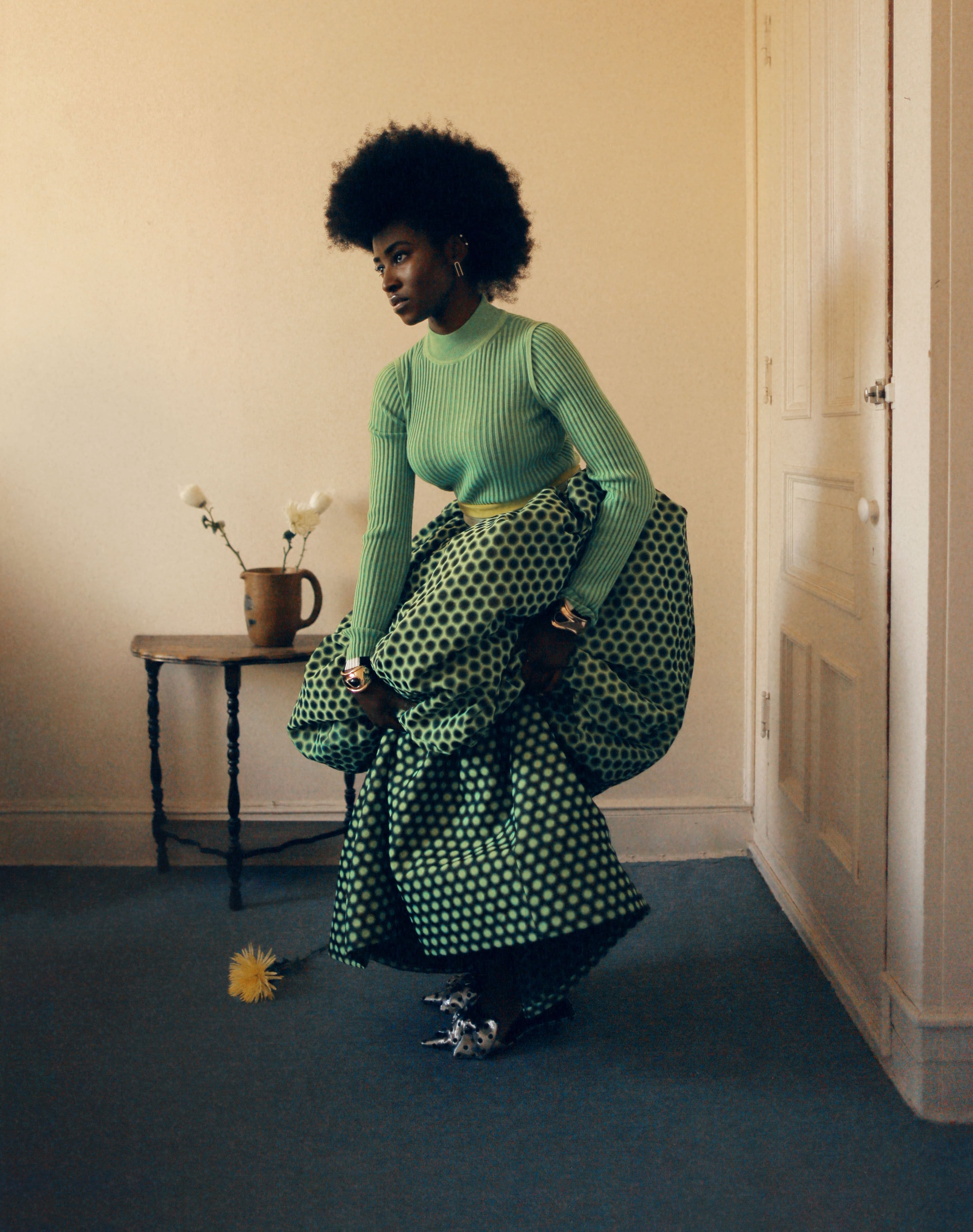 Dress by Christopher John Rogers. Shoes by Balenciaga. Earrings by Eriness. Bracelets by Tiffany & Co.