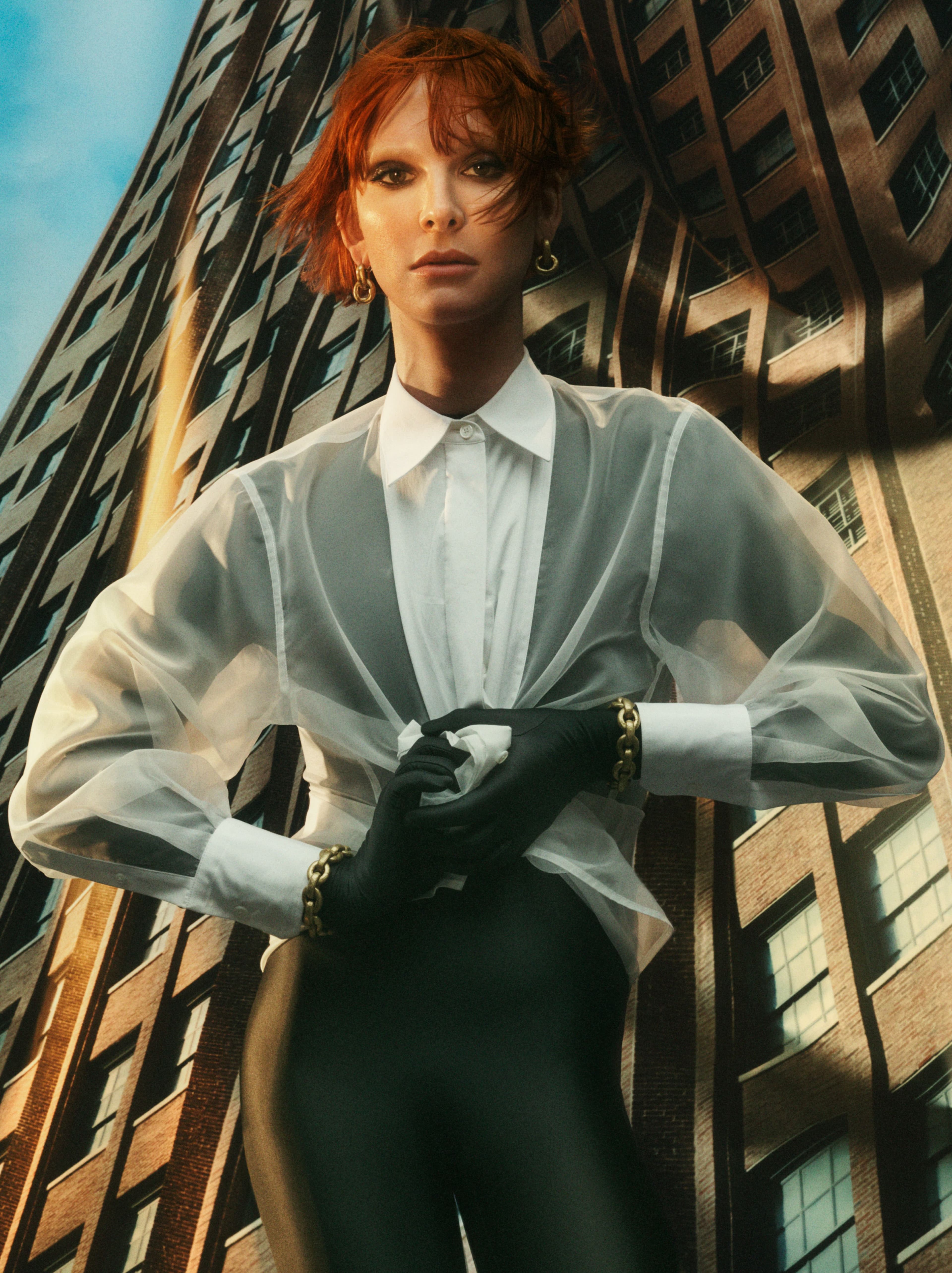 Shirt by Helmut Lang. Bodysuit by Marine Serre. All jewelry by Undercover.