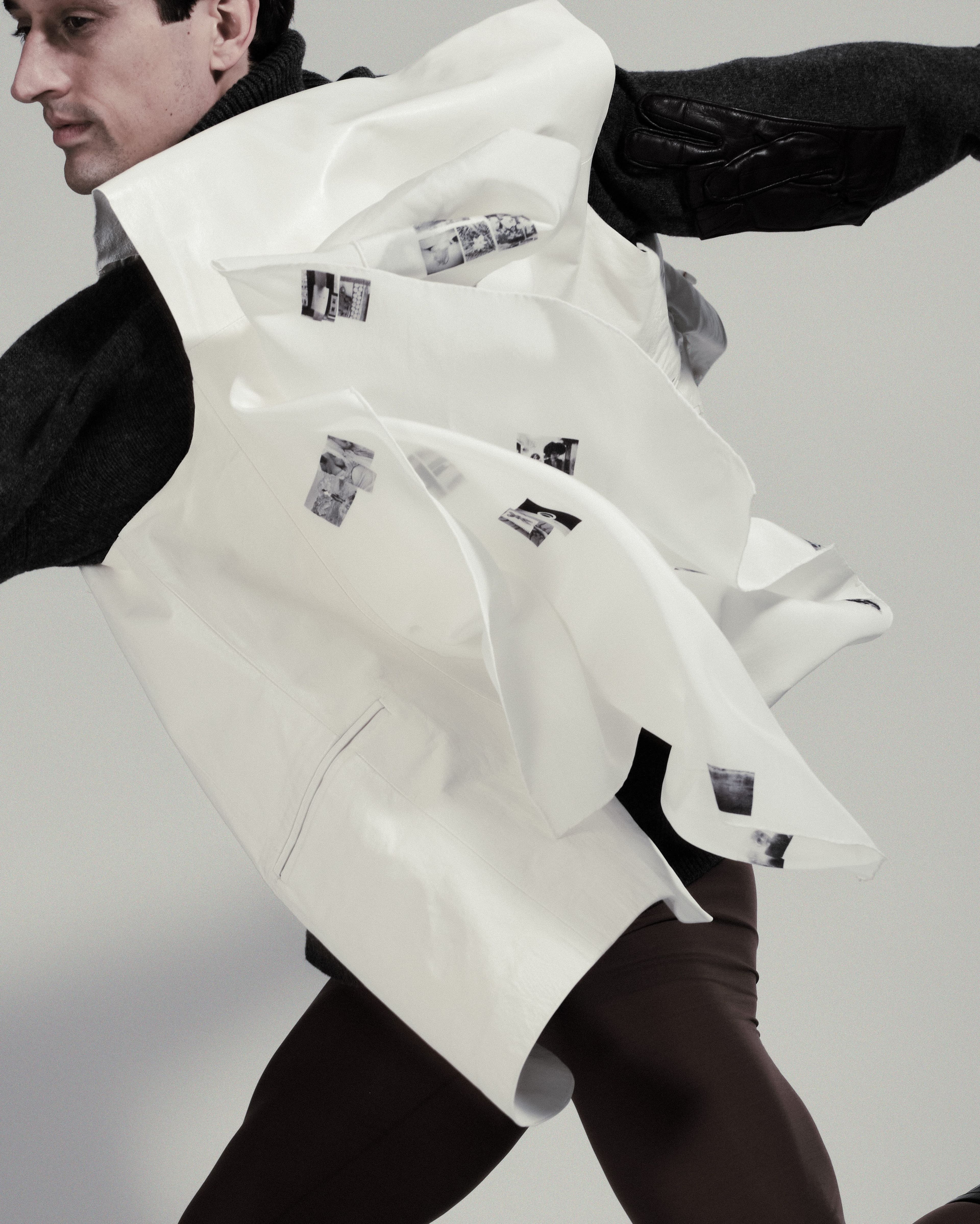 All clothing and boots by Raf Simons. Scarf by A--Company.