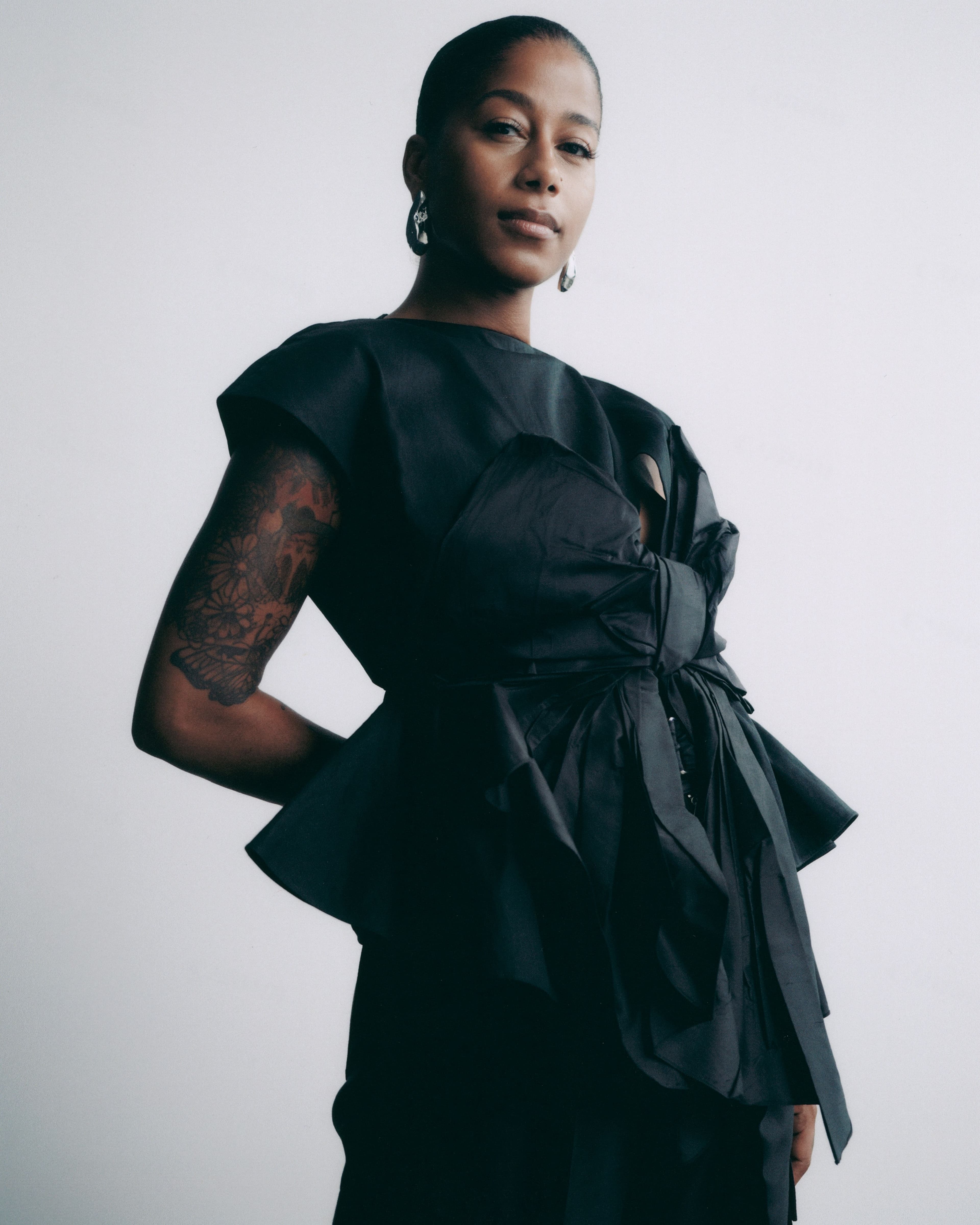 All clothing by Christopher John Rogers. Earrings by Alexis Bittar.