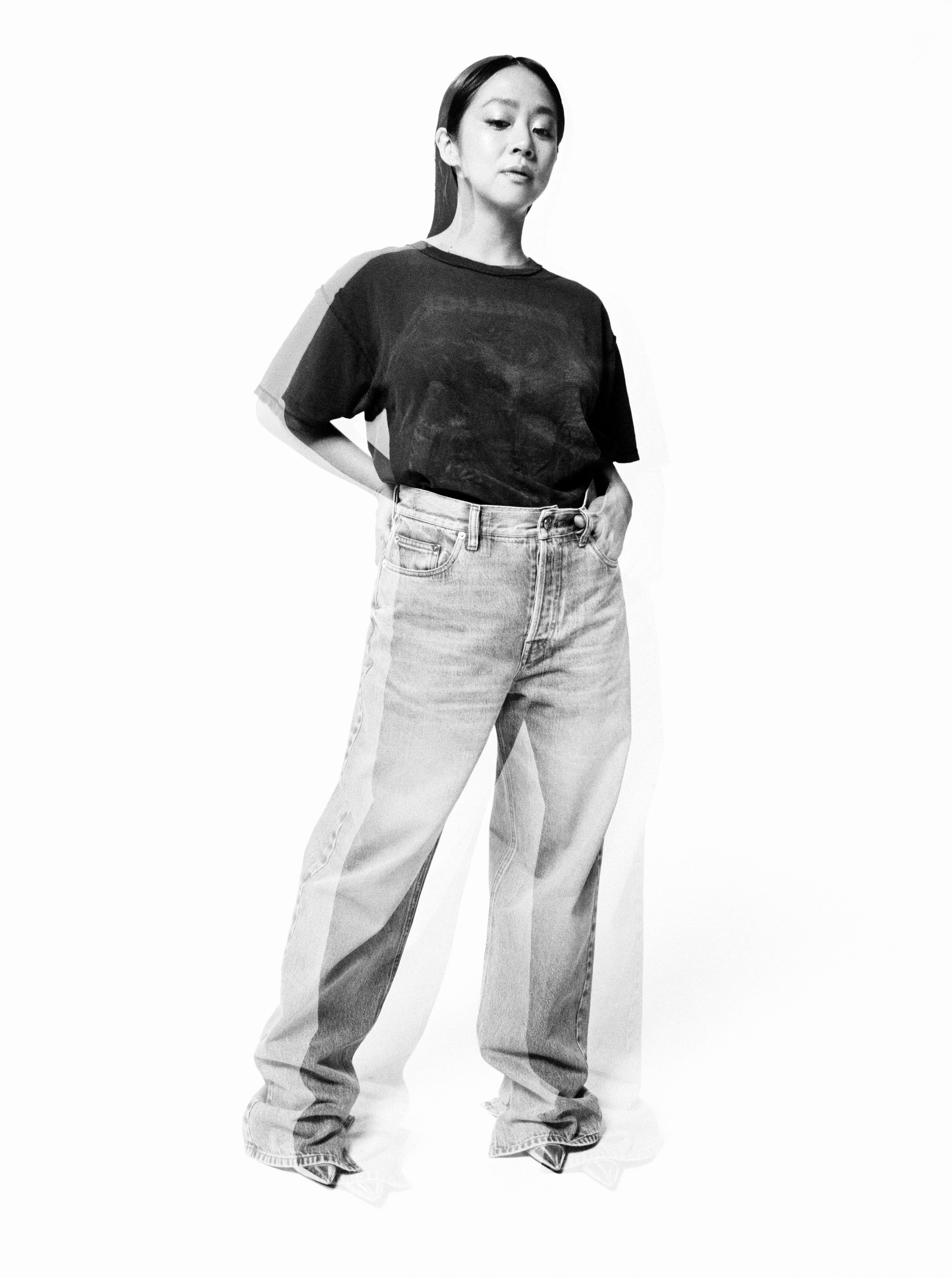T-SHIRT, stylist’s own. JEANS by ,Gucci., Vintage SHOES by ,Saint Laurent ,from Albright Fashion Library.
