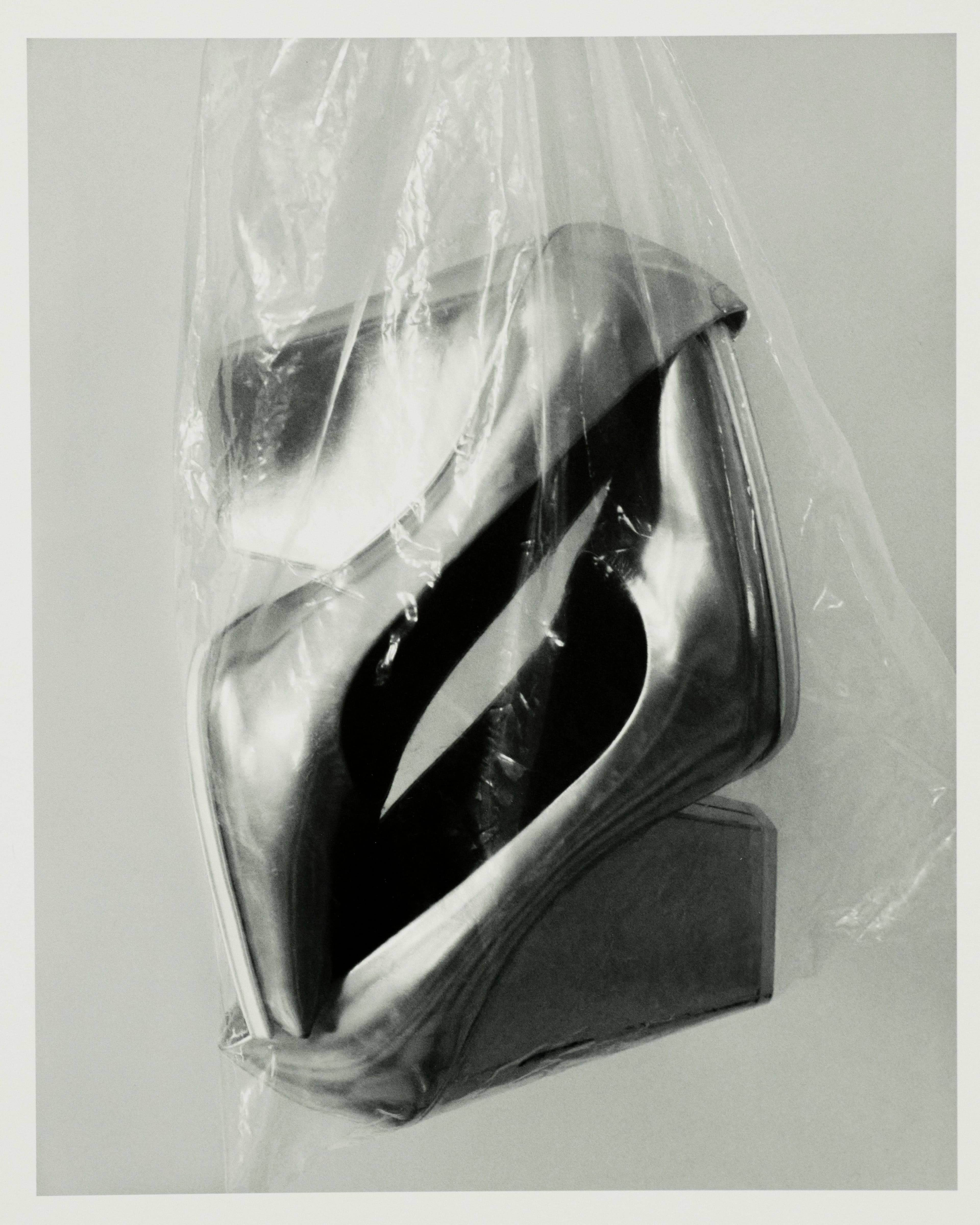 Vintage shoes by Céline, Fall 2012, from the Albright Fashion Library. This geometric heeled shoe was introduced under the creative direction of Phoebe Philo. The silhouette became a signature identifier of the brand and was reproduced throughout her time at Céline.